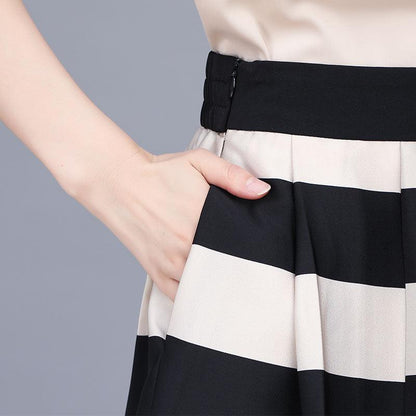 Conjunto Beleza Pura™: Saia com Listras Notáveis e Blusa Elegante!