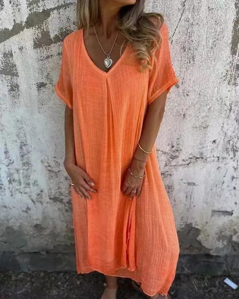 Vestido Serena™ com Caimento Solto e Gola V / Conforto Leve e Estilo Natural para Qualquer Ocasião!