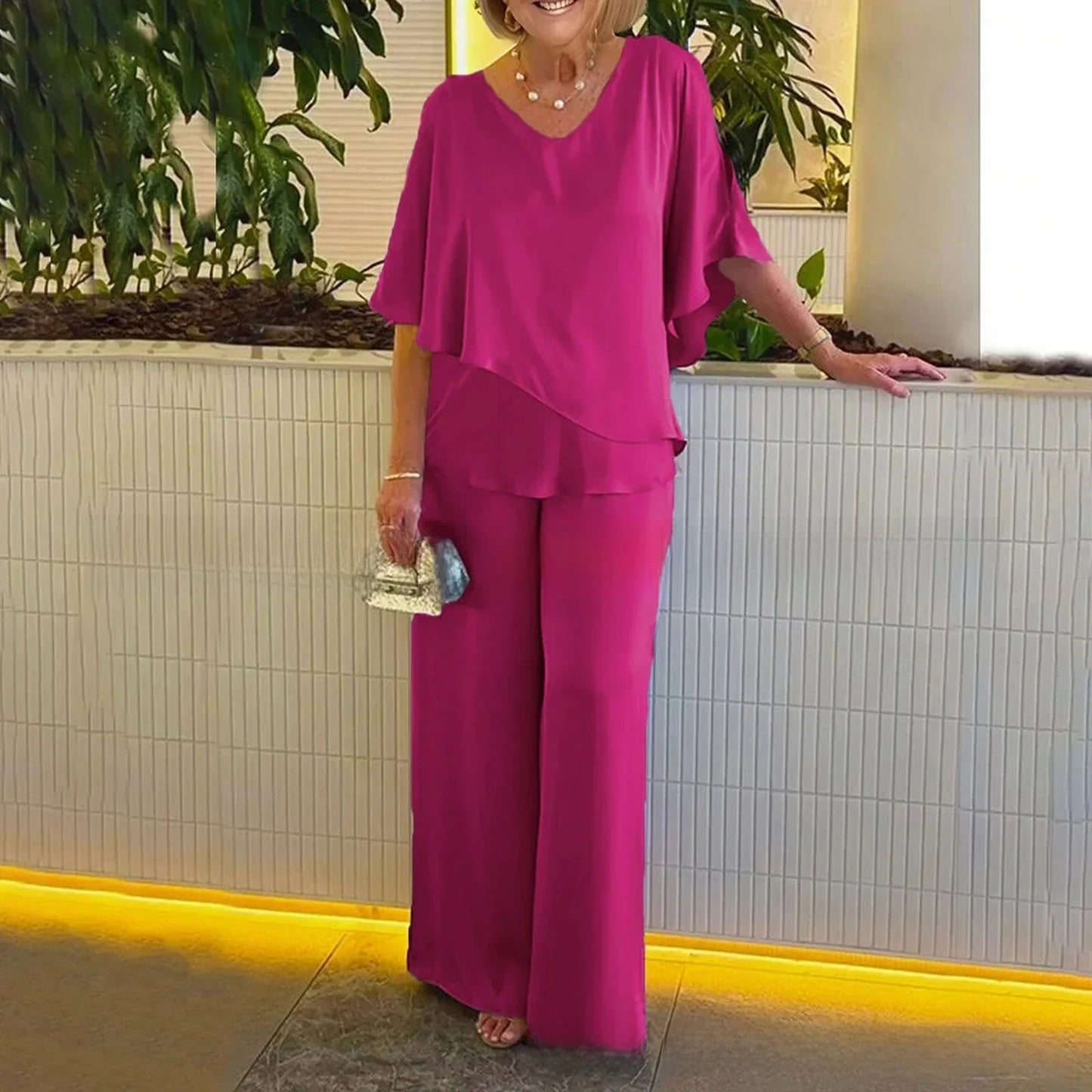 Conjunto Mirelly™ em Malha Premium com Blusa Assimétrica e Pantalona Elegante