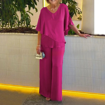 Conjunto Mirelly™ em Malha Premium com Blusa Assimétrica e Pantalona Elegante