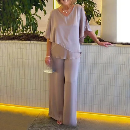 Conjunto Mirelly™ em Malha Premium com Blusa Assimétrica e Pantalona Elegante
