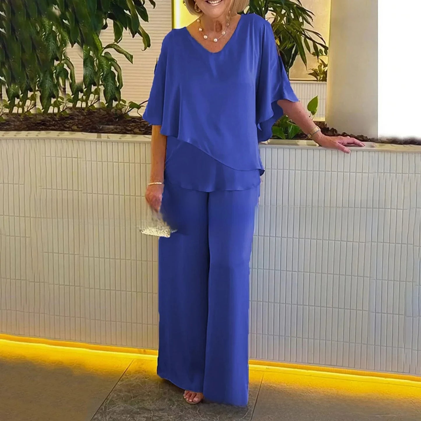 Conjunto Mirelly™ em Malha Premium com Blusa Assimétrica e Pantalona Elegante