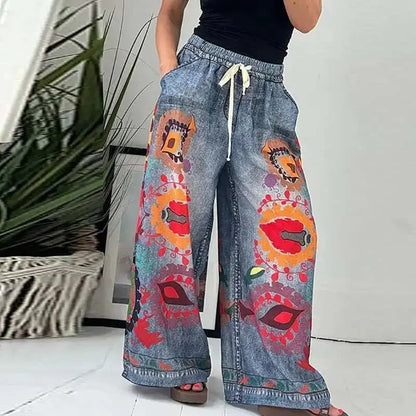 Calça Jeans Estampada Veraneio™ com Cós Elástico Confortável e Modelagem Ampla / Arte, Movimento e Expressão em Cada Passo!