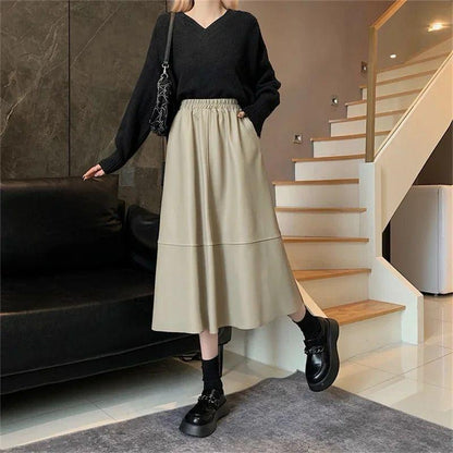 Saia Aretuzza™ em Couro Pu com Cintura Elástica/ Chique e Confortável na Medida Certa para Dias Quentes!
