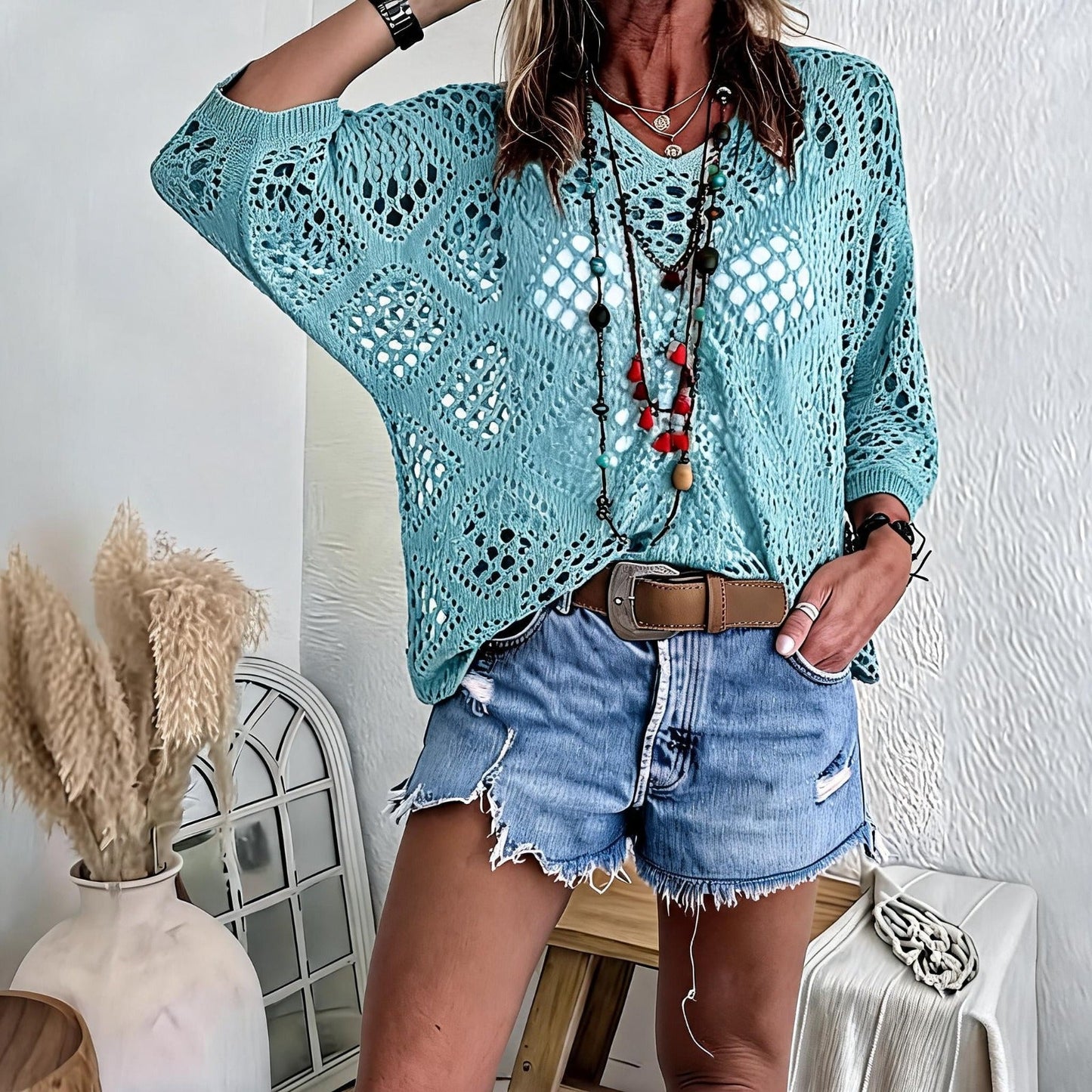 Blusa CityBreeze™ em Tricô Vazado e Modelagem Solta