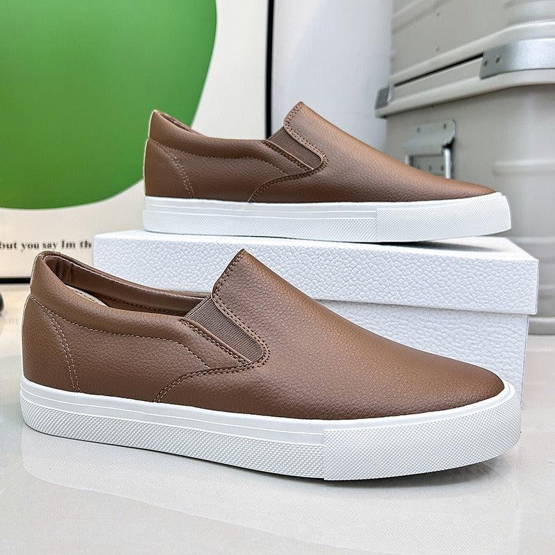 Tênis Masculino StreetComfort™ em Couro com Acabamento Minimalista / Visual Inteligente e Zero Desconforto na Rotina!