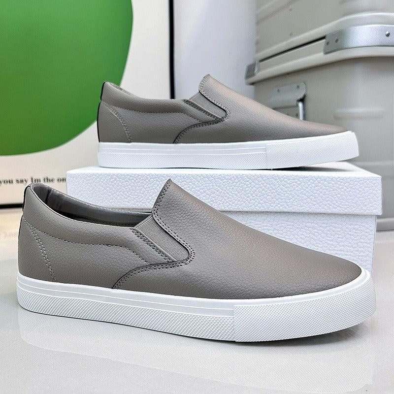 Tênis Masculino StreetComfort™ em Couro com Acabamento Minimalista / Visual Inteligente e Zero Desconforto na Rotina!