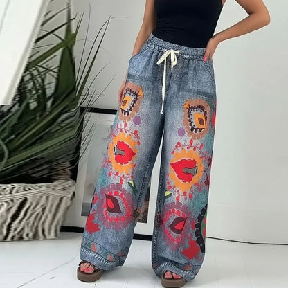 Calça Jeans Estampada Veraneio™ com Cós Elástico Confortável e Modelagem Ampla / Arte, Movimento e Expressão em Cada Passo!