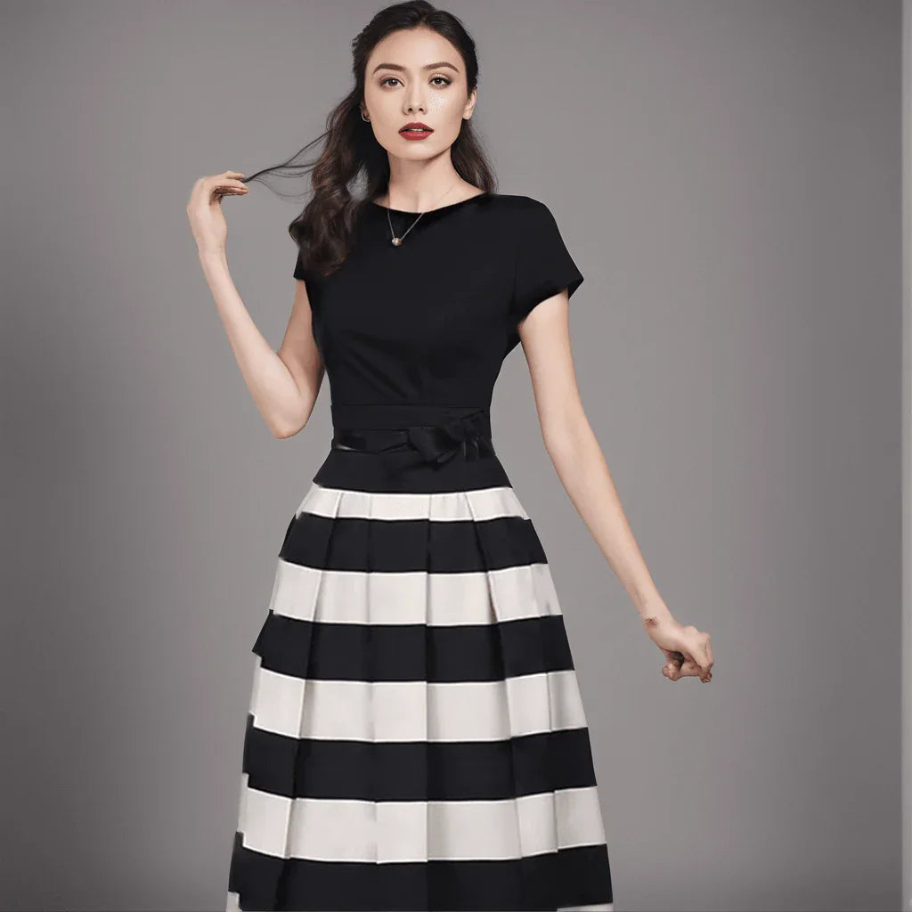 Conjunto Beleza Pura™: Saia com Listras Notáveis e Blusa Elegante!